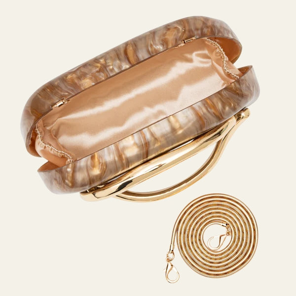 The Capri Sculptural Handle Clutch