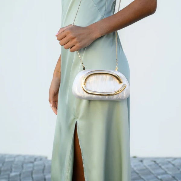 The Capri Sculptural Handle Clutch