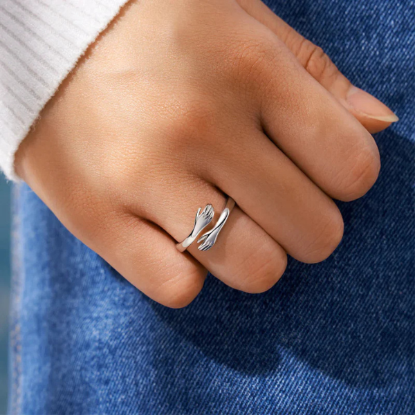 The Solis Open Hand Embrace Ring