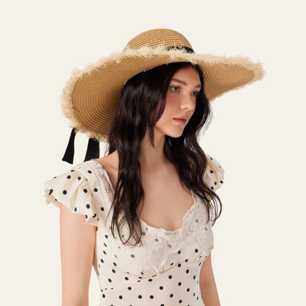 The Riviera Frayed-Edge Straw Hat