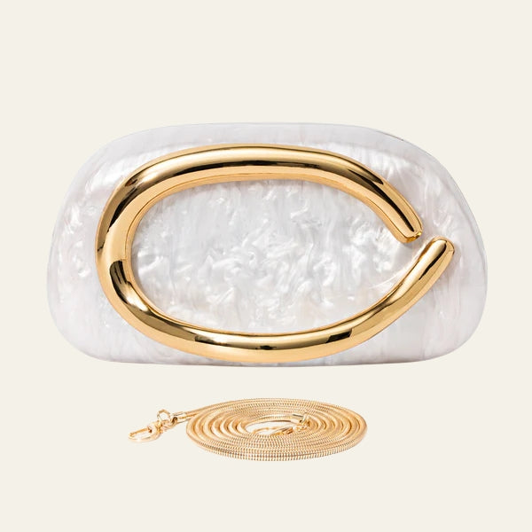 The Capri Sculptural Handle Clutch