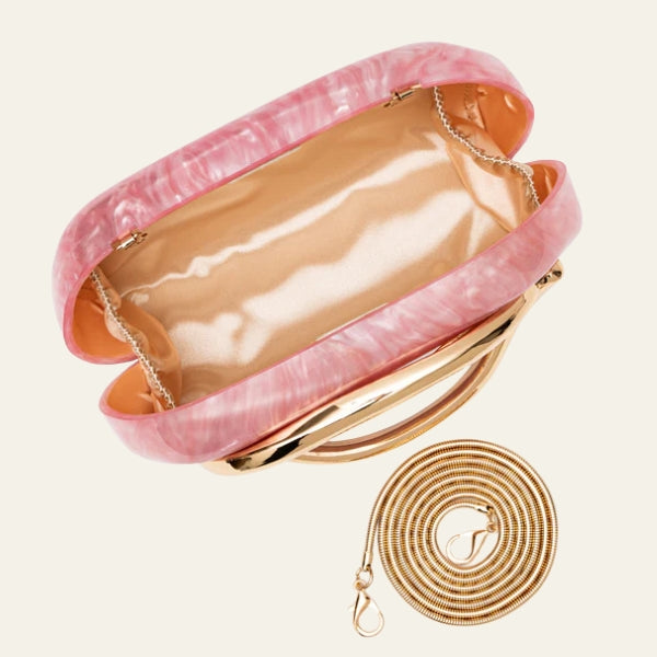 The Capri Sculptural Handle Clutch