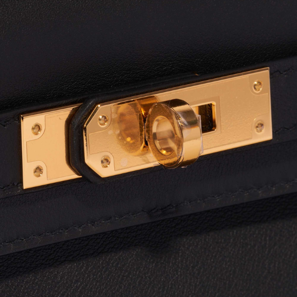 The Florence Leather Top-Handle Clutch