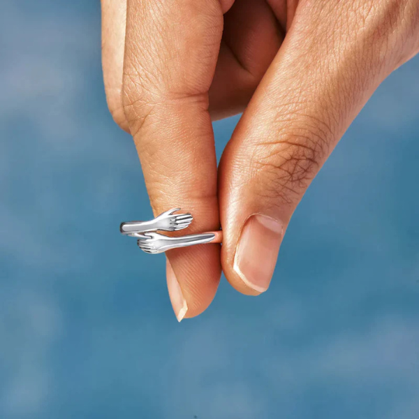 The Solis Open Hand Embrace Ring