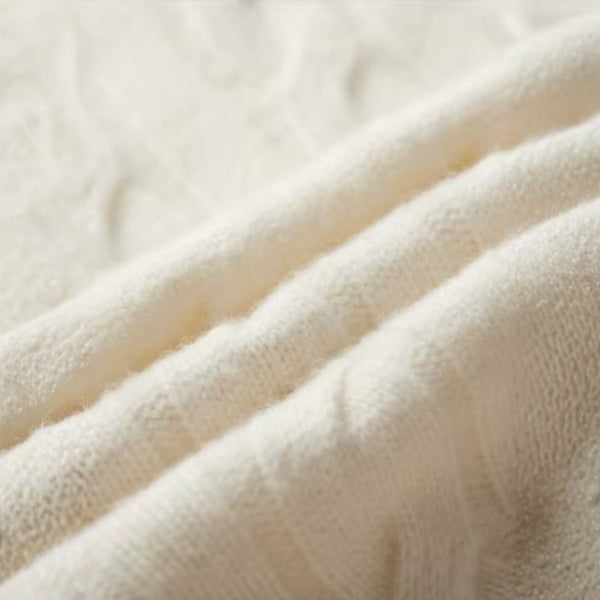 The Cortina Merino Wool Cable Zip Knit