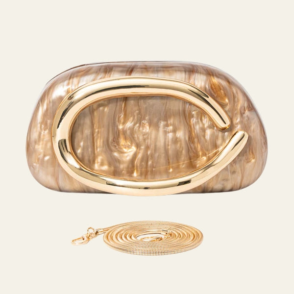 The Capri Sculptural Handle Clutch